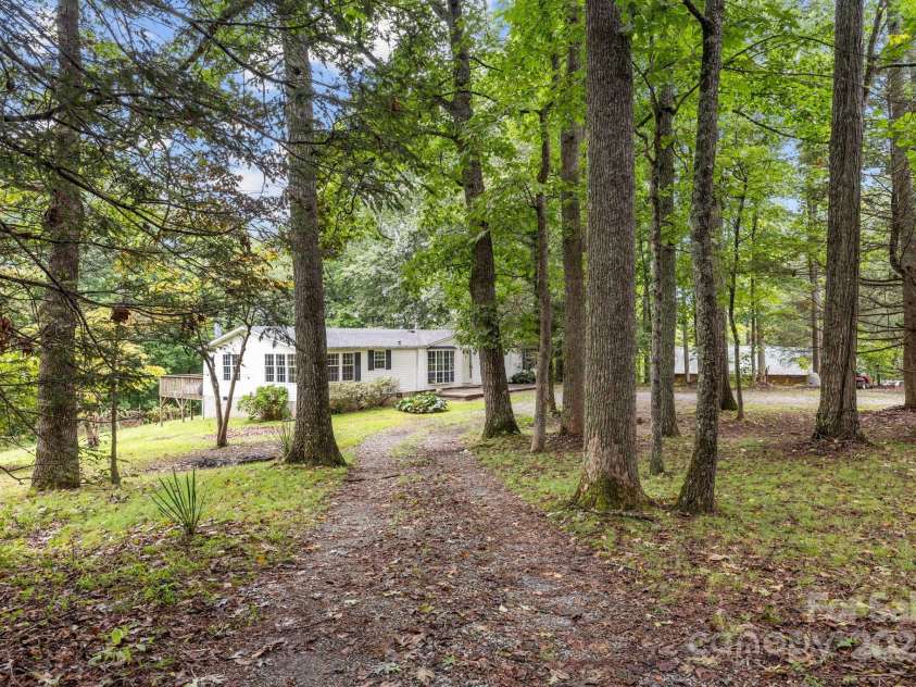 573 Deep Gap Loop Road, Flat Rock, NC 28731.  MLS# CAR4295094, YatesRealty ID 33611. Mature trees