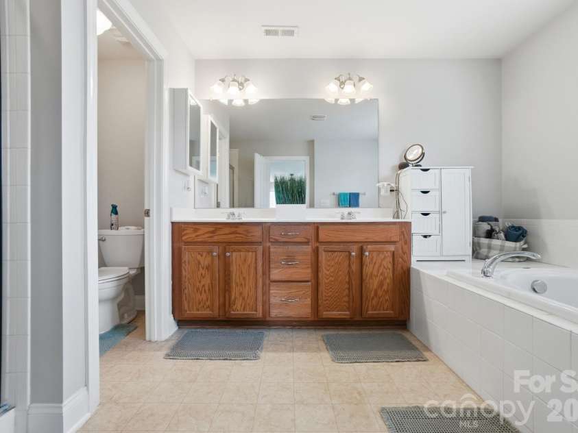 5217 Firebrick Lane, Concord, NC 28025.  MLS# CAR4383489, YatesRealty ID 33612. Primary Bathroom