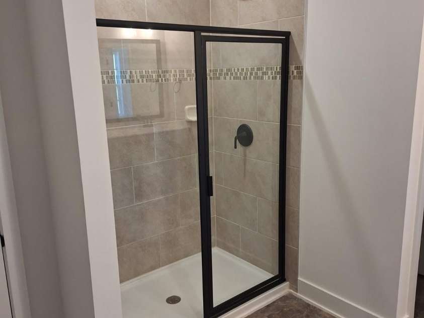 1215 Gardenia Drive, Mt Ulla, NC 28125.  MLS# CAR4375396, YatesRealty ID 33614. 5 ft tiled shower in primary bath