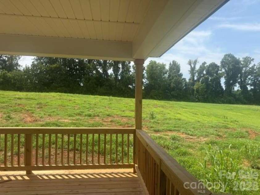 1215 Gardenia Drive, Mt Ulla, NC 28125.  MLS# CAR4375396, YatesRealty ID 33614. 