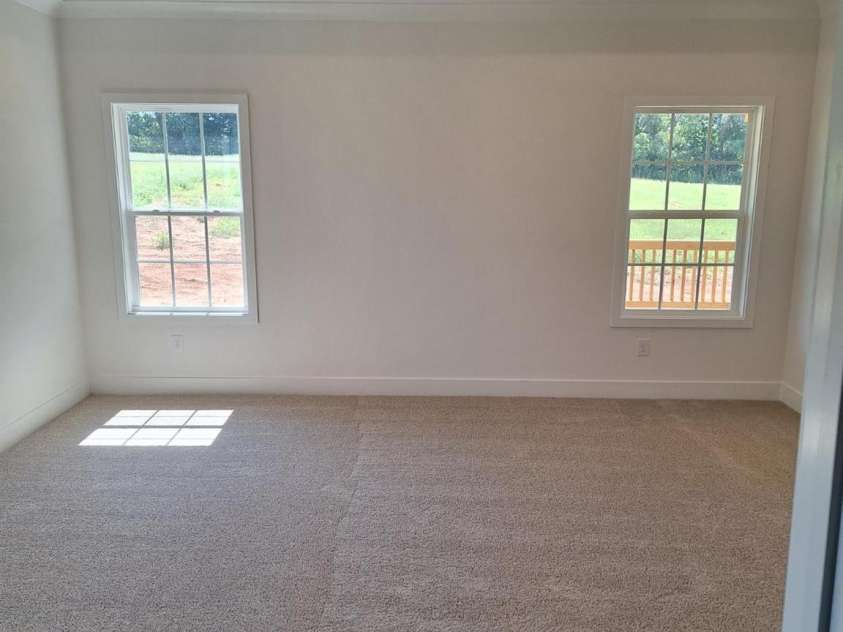 1215 Gardenia Drive, Mt Ulla, NC 28125.  MLS# CAR4375396, YatesRealty ID 33614. Primary bedroom with tray ceilings