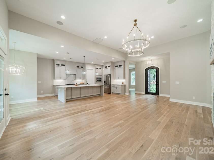 4028 Spindrift Cove Drive, Denver, NC 28037.  MLS# CAR4270075, YatesRealty ID 33617. Enjoy stunning Open Concept Living with gorgeous hardwood floors, custom lighting, and luxurious finishes