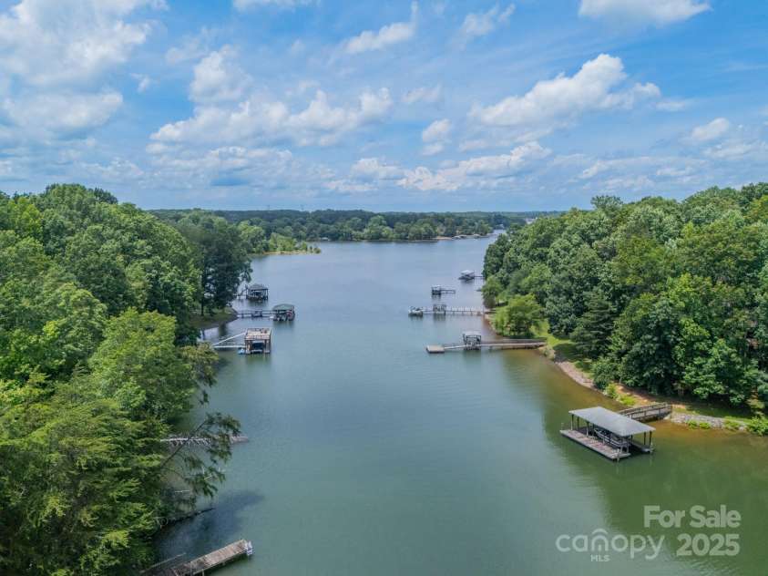 4028 Spindrift Cove Drive, Denver, NC 28037.  MLS# CAR4270075, YatesRealty ID 33617. Enjoy the gorgeous lake lifestyle living in this private Lake Norman Estate on 2.03 acres!