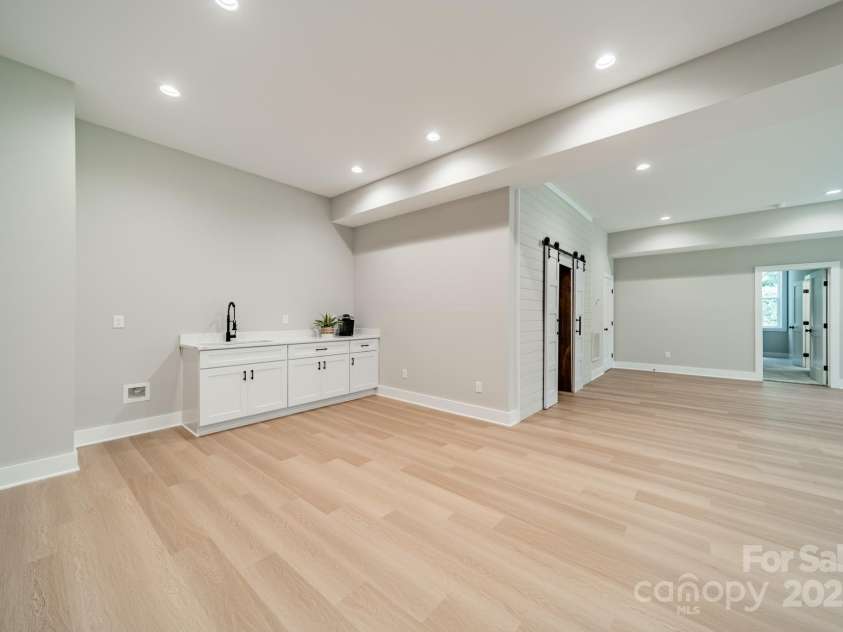 4028 Spindrift Cove Drive, Denver, NC 28037.  MLS# CAR4270075, YatesRealty ID 33617. The Lower Level boasts a large Wet Bar or Coffee Bar for entertaining