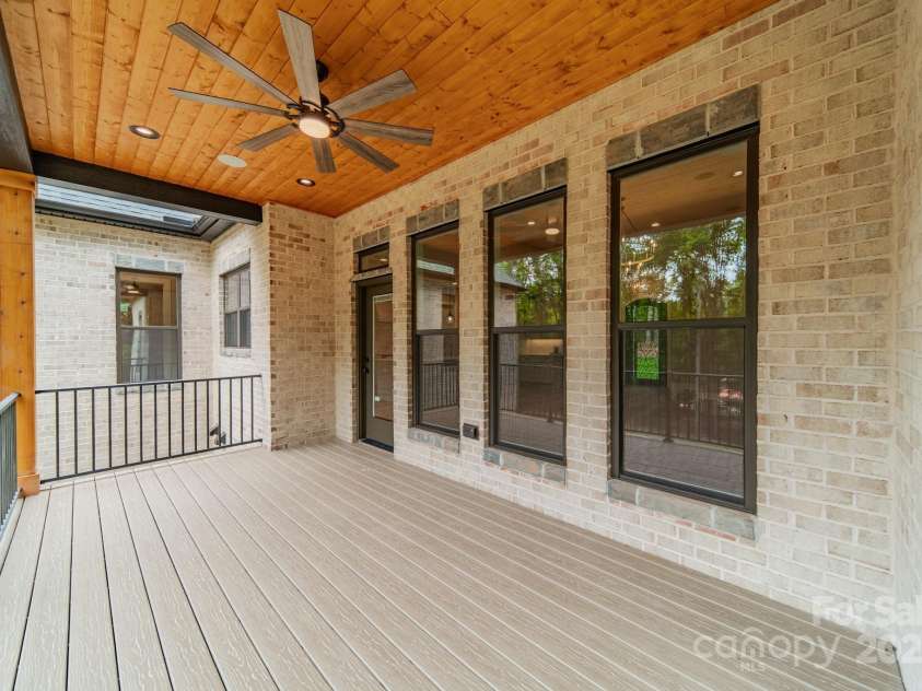 4028 Spindrift Cove Drive, Denver, NC 28037.  MLS# CAR4270075, YatesRealty ID 33617. The Main Level Patio off of the Living Room allows you to have stunning views of Lake Norman