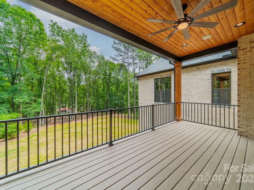 4028 Spindrift Cove Drive, Denver, NC 28037.  MLS# CAR4270075, YatesRealty ID 33617. The Main Level Patio off of the Living Room allows you to have stunning views of Lake Norman