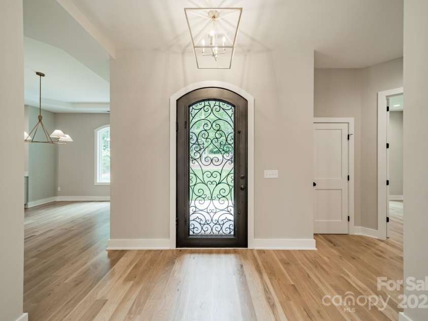 4028 Spindrift Cove Drive, Denver, NC 28037.  MLS# CAR4270075, YatesRealty ID 33617. Welcome home to your stunning Lake Norman Estate on 2.03 acres of lakefront living!