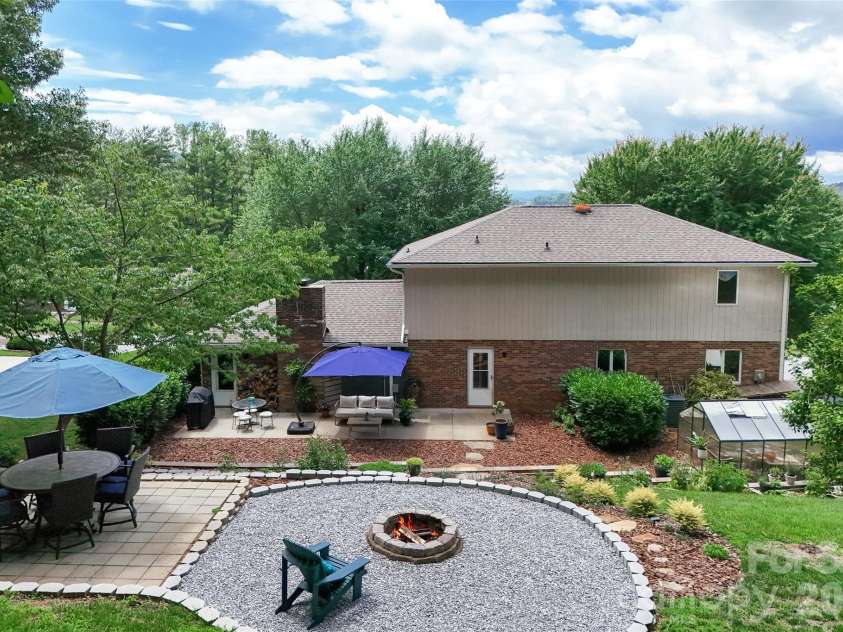 53 Braddock Way, Asheville, NC 28803.  MLS# CAR4385957, YatesRealty ID 33619. New patio and firepit