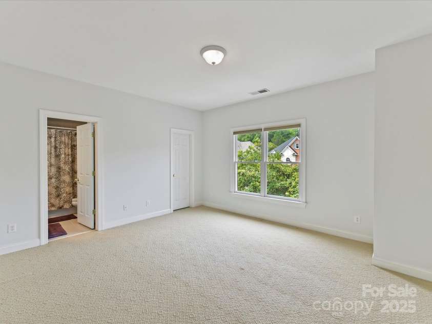 7717 Quail Park Drive, Charlotte, NC 28210.  MLS# CAR4289882, YatesRealty ID 33625. Bedroom with ensuite