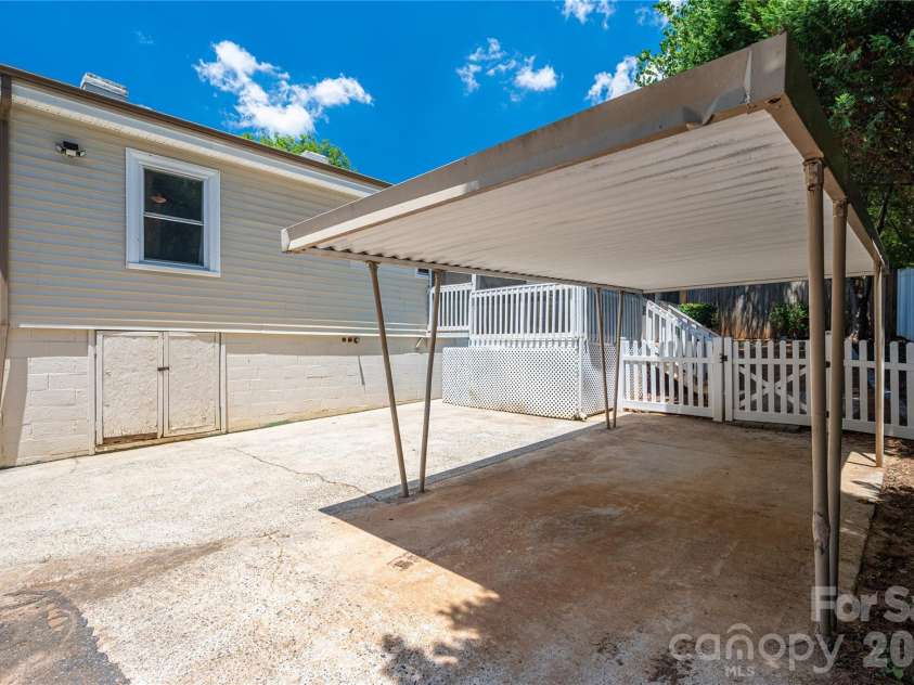 58 4th Street, Cramerton, NC 28032.  MLS# CAR4392035, YatesRealty ID 33628. Carport 