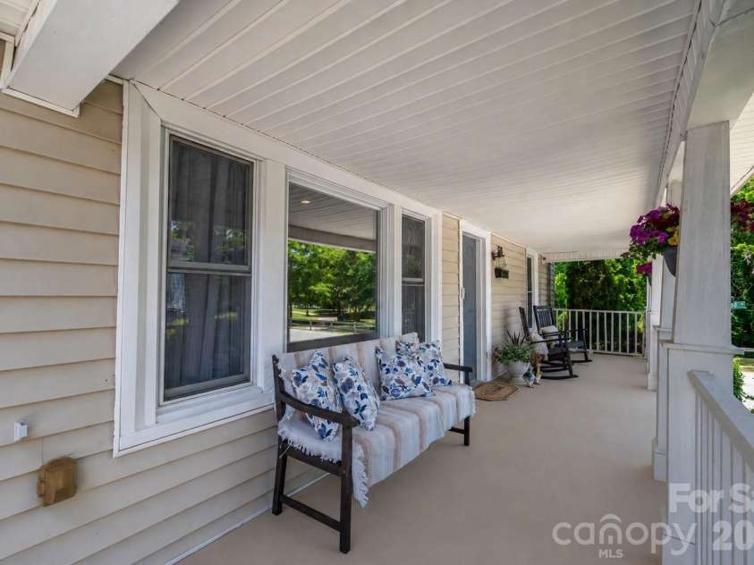 58 4th Street, Cramerton, NC 28032.  MLS# CAR4392035, YatesRealty ID 33628. Front porch view overlooking the front yard 