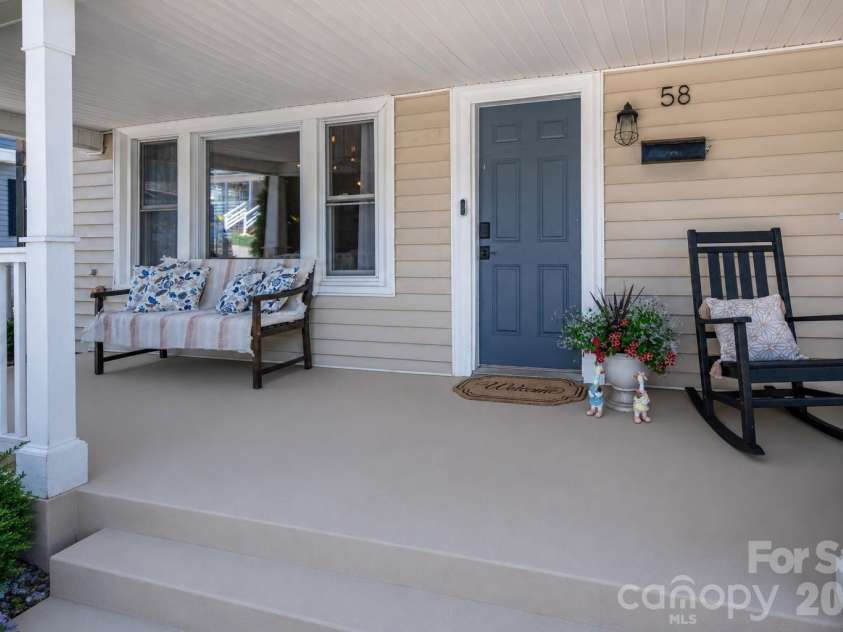 58 4th Street, Cramerton, NC 28032.  MLS# CAR4392035, YatesRealty ID 33628. Front porch view overlooking the front yard 