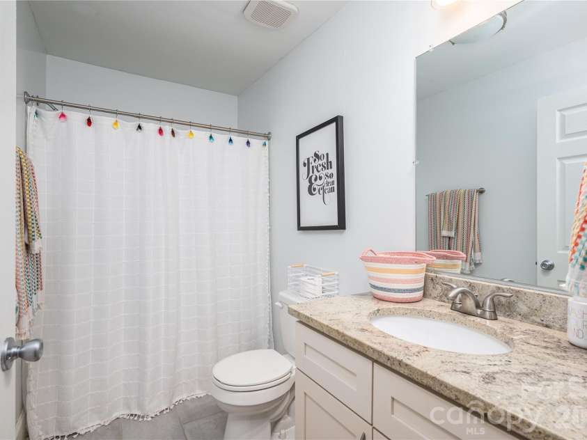 58 4th Street, Cramerton, NC 28032.  MLS# CAR4392035, YatesRealty ID 33628. Guest Bathroom