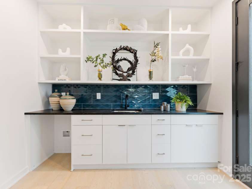 414 State Street, Charlotte, NC 28208.  MLS# CAR4273490, YatesRealty ID 33629. Downstairs kitchenette.