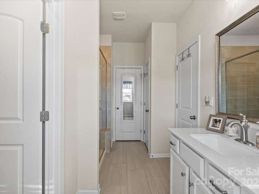 2147 Stevens Mill Road, Matthews, NC 28104.  MLS# CAR4231324, YatesRealty ID 3363. 