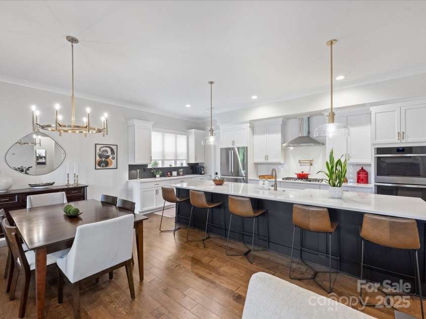 13627 Tranquil Day Drive, Matthews, NC 28105.  MLS# CAR4285895, YatesRealty ID 33636. Kitchen and Dining Space