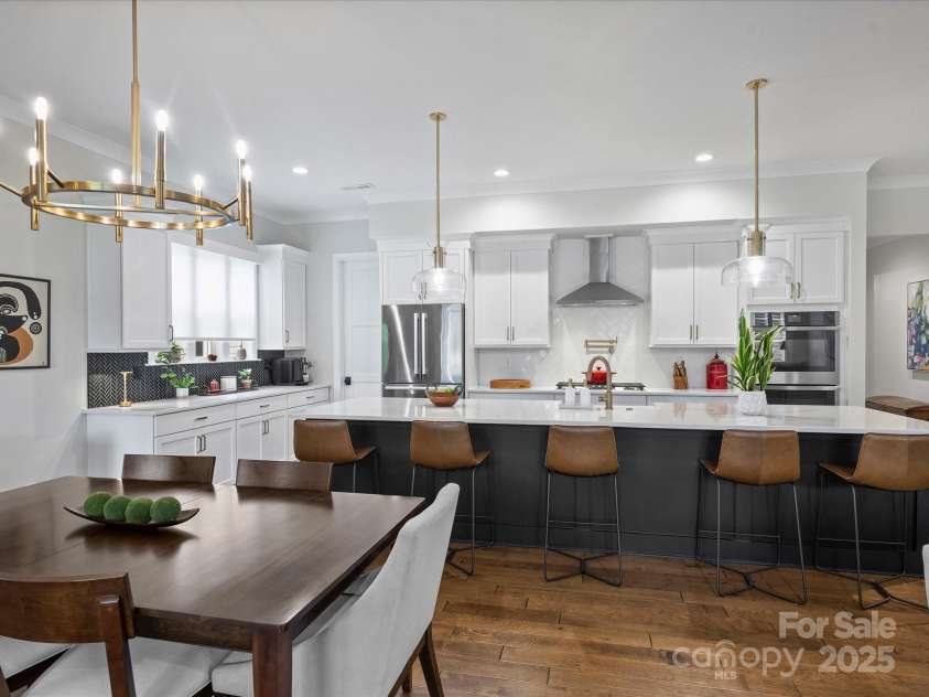 13627 Tranquil Day Drive, Matthews, NC 28105.  MLS# CAR4285895, YatesRealty ID 33636. Kitchen and Dining Space