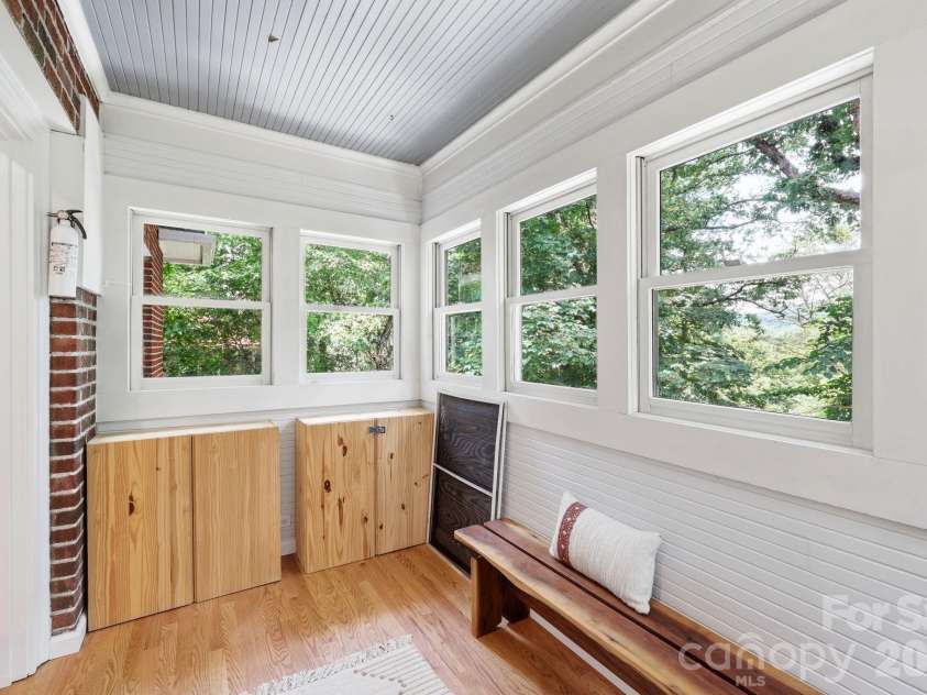 23 Warwick Place, Asheville, NC 28804.  MLS# CAR4394325, YatesRealty ID 33637. Again, light filled and extra storage cabinets.