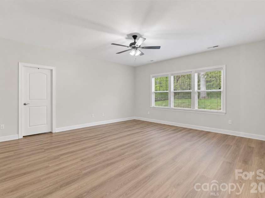 15109 Ockeechobee Court, Mint Hill, NC 28227.  MLS# CAR4392005, YatesRealty ID 33638. Great Room-Back Yard View