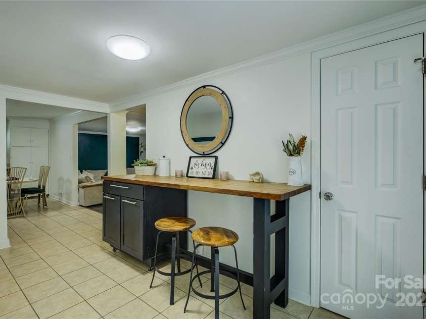 2111 Hodgin Street, Gastonia, NC 28056.  MLS# CAR4289182, YatesRealty ID 33638. Open hallway extending from kitchen could be used as dining room