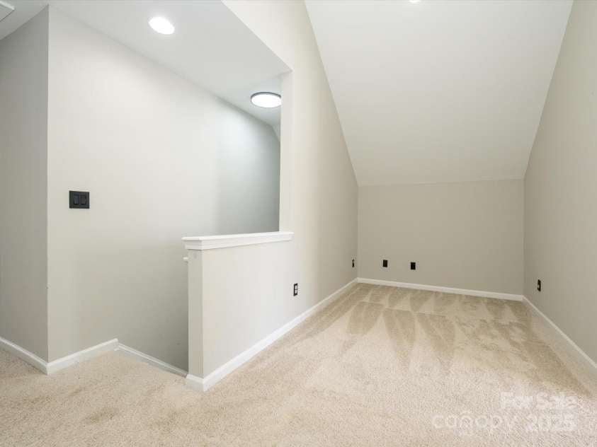 7220 Hidden Creek Drive, Charlotte, NC 28214.  MLS# CAR4225936, YatesRealty ID 3364. Additional loft area at top of the stairs