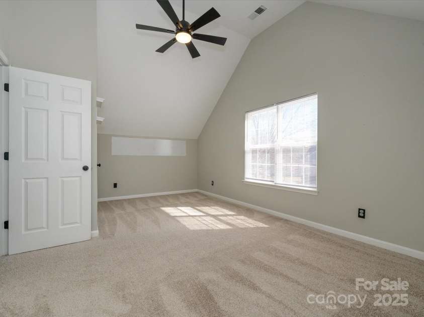 7220 Hidden Creek Drive, Charlotte, NC 28214.  MLS# CAR4225936, YatesRealty ID 3364. Bonus room with vaulted ceilings and ceiling fan