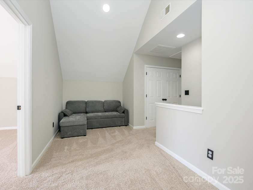 7220 Hidden Creek Drive, Charlotte, NC 28214.  MLS# CAR4225936, YatesRealty ID 3364. Convenient loft at top of the stairs can be gaming or office area