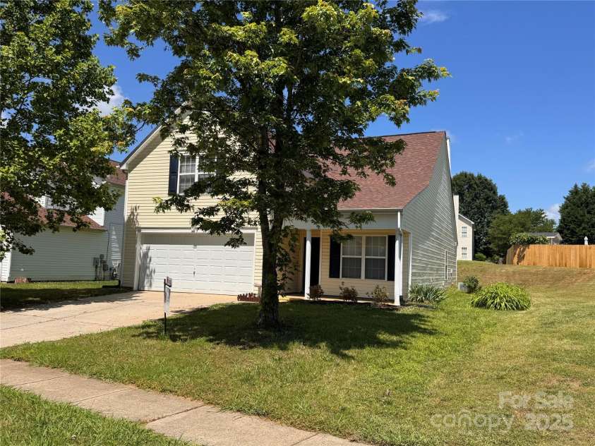 7220 Hidden Creek Drive, Charlotte, NC 28214.  MLS# CAR4225936, YatesRealty ID 3364. Corner lot with great privacy and pretty tree cover