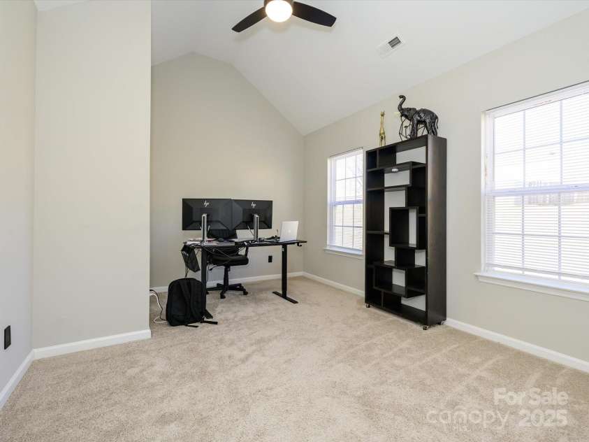 7220 Hidden Creek Drive, Charlotte, NC 28214.  MLS# CAR4225936, YatesRealty ID 3364. Main level guest bedroom also makes great home office or homeschool space