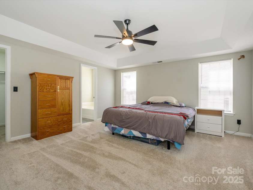 7220 Hidden Creek Drive, Charlotte, NC 28214.  MLS# CAR4225936, YatesRealty ID 3364. Primary bedroom with ceiling fan