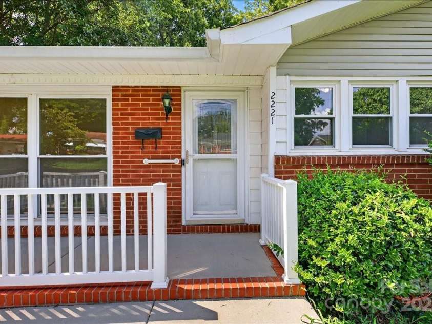 2221 Ludlow Drive, Charlotte, NC 28216.  MLS# CAR4292812, YatesRealty ID 33644. Close-up entryway and front porch