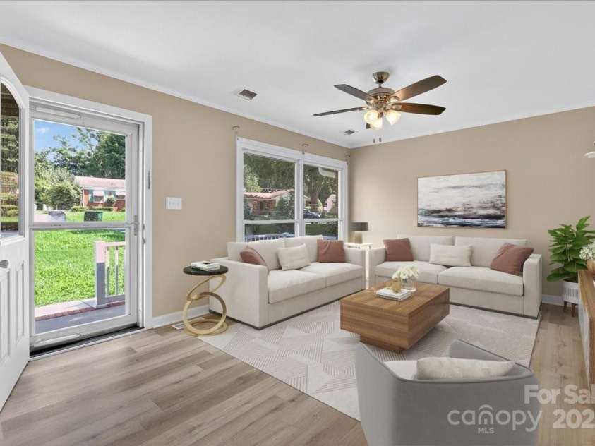 2221 Ludlow Drive, Charlotte, NC 28216.  MLS# CAR4292812, YatesRealty ID 33644. Living Room *Virtually Staged*