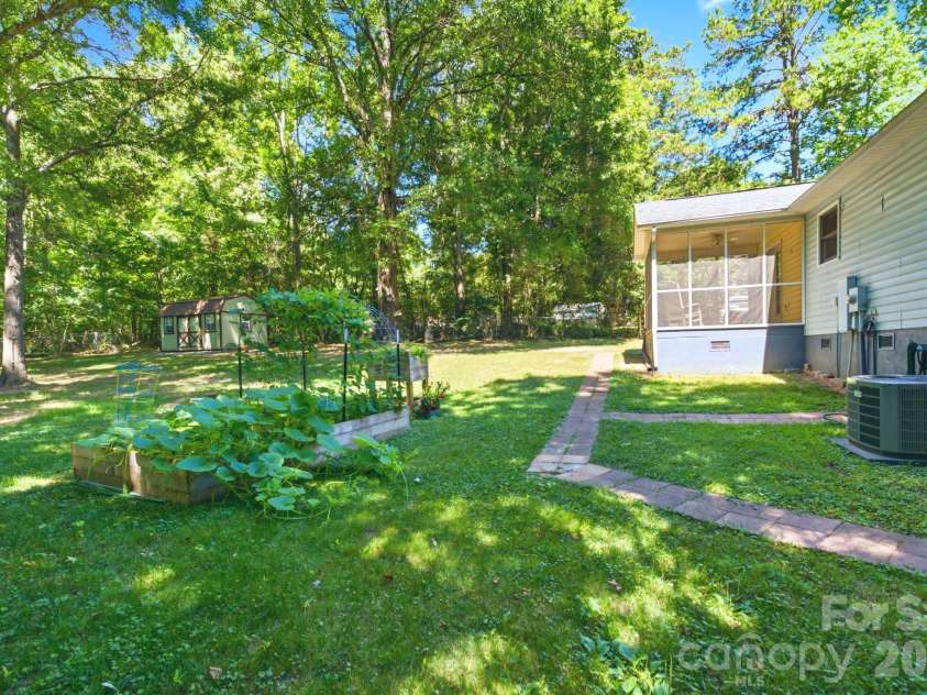 1949 Ridge Road, Clover, SC 29710.  MLS# CAR4396969, YatesRealty ID 33646. Shaded yard