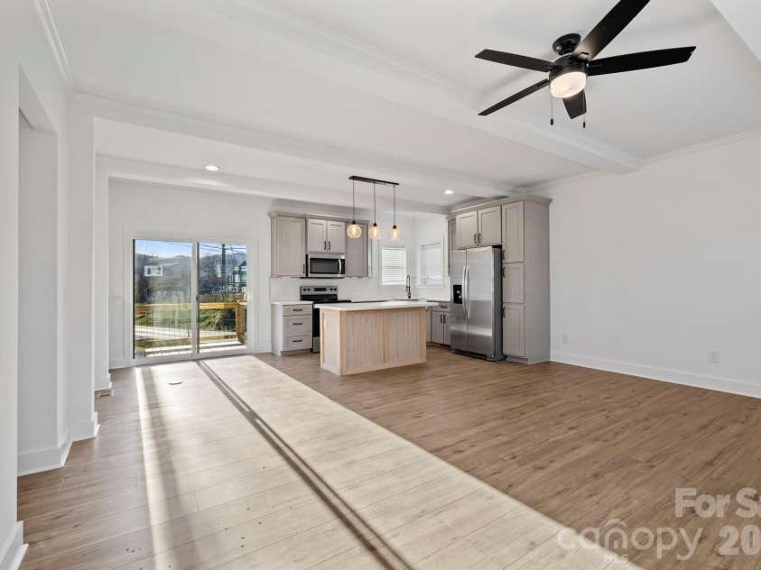 203 Southern Charm Road, Arden, NC 28704.  MLS# CAR4342838, YatesRealty ID 3365. Large Great room w/ Coffered Ceilings