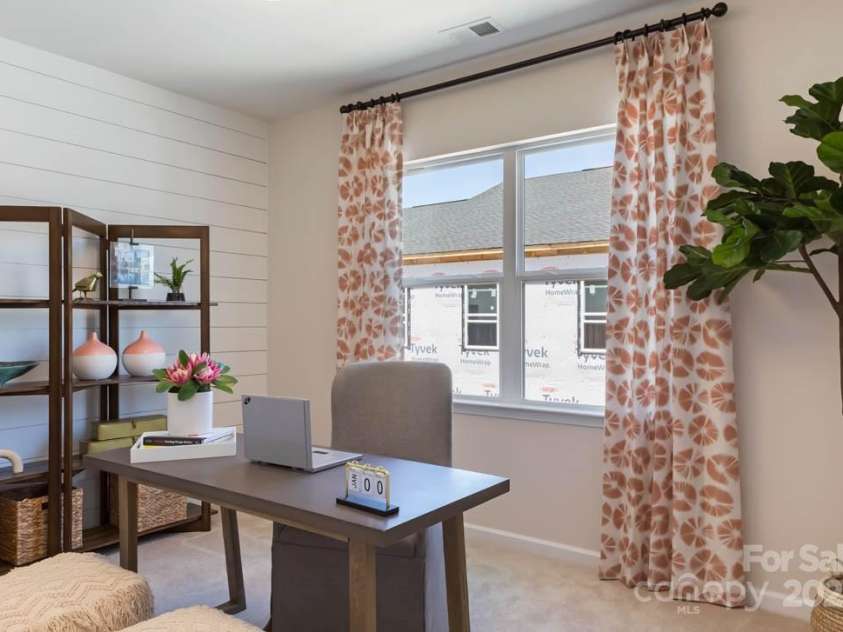 8928 Connover Hall Avenue, Charlotte, NC 28215.  MLS# CAR4199321, YatesRealty ID 3365. PLAN 3 MODEL BEDROOM 3 | This is a model of the home design. Please note that this is a representation only and the final construction may differ in appearance, features, and finishes