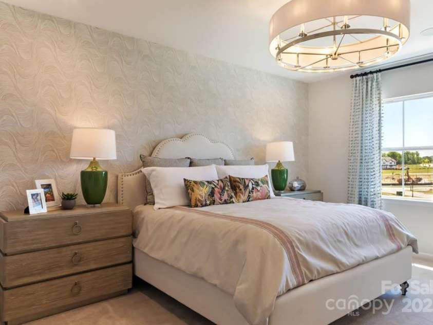 8928 Connover Hall Avenue, Charlotte, NC 28215.  MLS# CAR4199321, YatesRealty ID 3365. PLAN 3 MODEL PRIMARY BEDROOM | This is a model of the home design. Please note that this is a representation only and the final construction may differ in appearance, features, and finishes