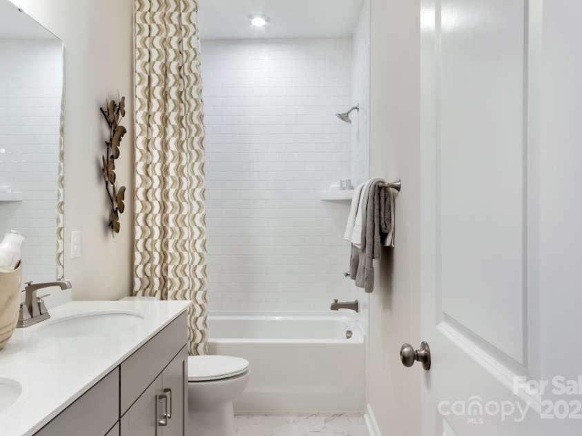 8928 Connover Hall Avenue, Charlotte, NC 28215.  MLS# CAR4199321, YatesRealty ID 3365. PLAN 3 MODEL SECRONDAY BATH | This is a model of the home design. Please note that this is a representation only and the final construction may differ in appearance, features, and finishes