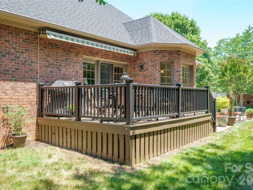 314 River Birch Circle, Mooresville, NC 28115.  MLS# CAR4395045, YatesRealty ID 33650. Composite and Metal Deck installed July 2025. Retractable Awning with remote control to enjoy dinners on the deck.