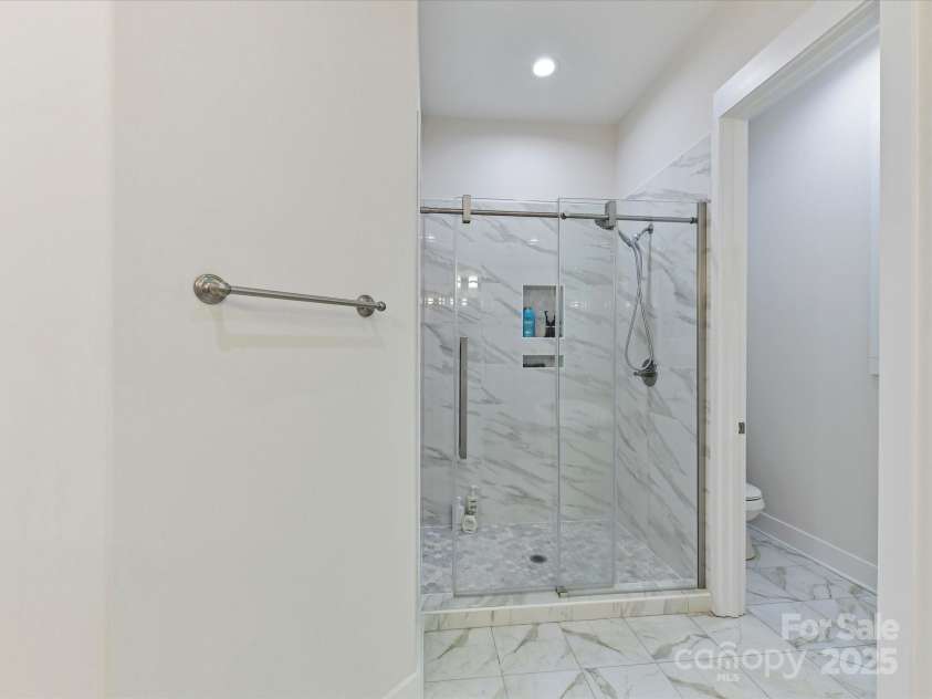 1409 Bloomsberry Lane, Waxhaw, NC 28173.  MLS# CAR4247521, YatesRealty ID 33651. Large walk in shower