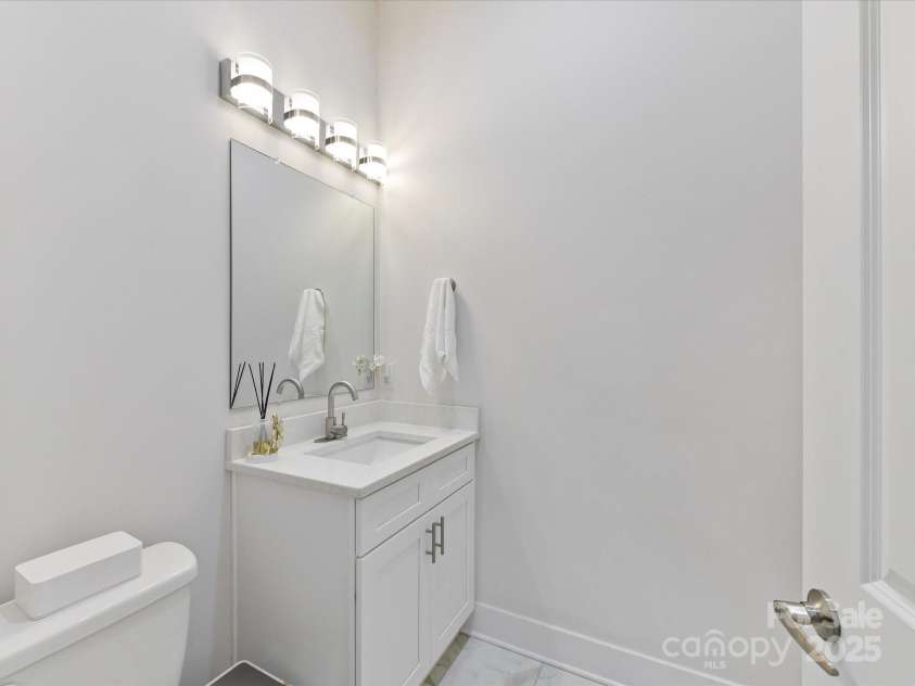 1409 Bloomsberry Lane, Waxhaw, NC 28173.  MLS# CAR4247521, YatesRealty ID 33651. Powder room on the main level for guests