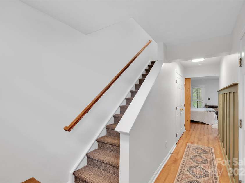 864 Tiger Lane, Charlotte, NC 28262.  MLS# CAR4278320, YatesRealty ID 33655. Bright & inviting entry on main leading to very private and spacious bedroom and living area on second level.