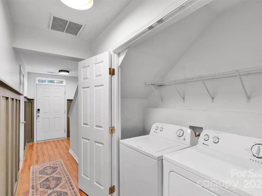 864 Tiger Lane, Charlotte, NC 28262.  MLS# CAR4278320, YatesRealty ID 33655. Conveniently located laundry nook just off the garage entry, with extra space for storage and a drop zone feel.