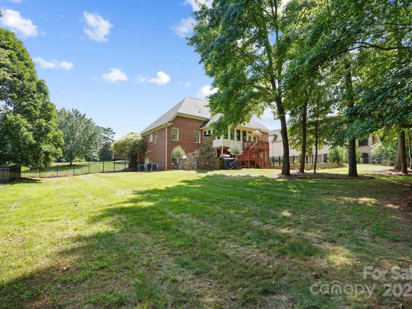 15035 Davis Trace Drive, Mint Hill, NC 28227.  MLS# CAR4282469, YatesRealty ID 33659. Fully Fenced in Backyard