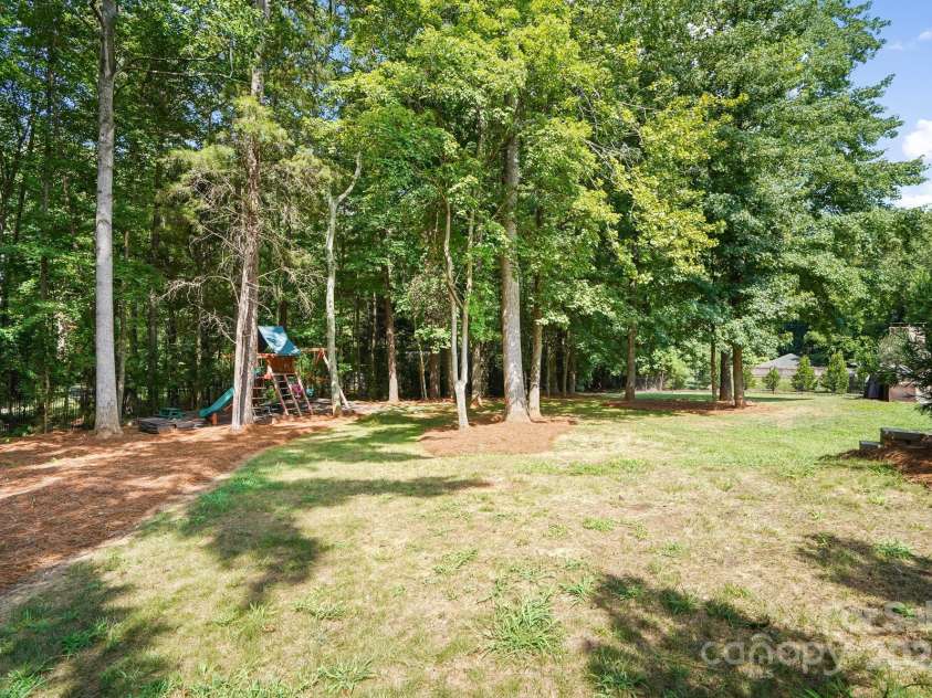 15035 Davis Trace Drive, Mint Hill, NC 28227.  MLS# CAR4282469, YatesRealty ID 33659. Fully Fenced in Backyard