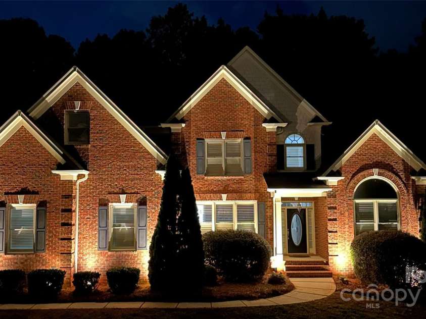 15035 Davis Trace Drive, Mint Hill, NC 28227.  MLS# CAR4282469, YatesRealty ID 33659. Home with Exterior Lights