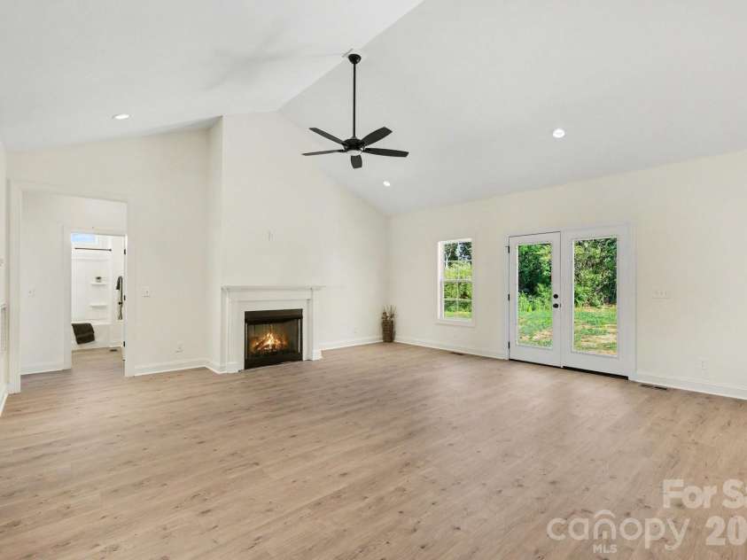 402 Dorothy Drive, China Grove, NC 28023.  MLS# CAR4393216, YatesRealty ID 33659. Large family room with gas log fire place