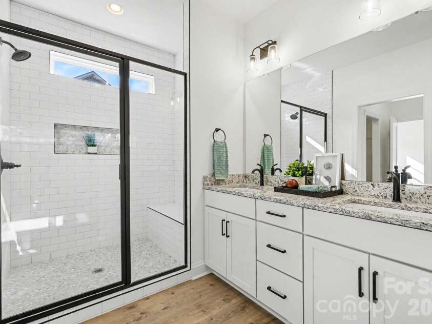 402 Dorothy Drive, China Grove, NC 28023.  MLS# CAR4393216, YatesRealty ID 33659. Primary suite  large custom tile shower