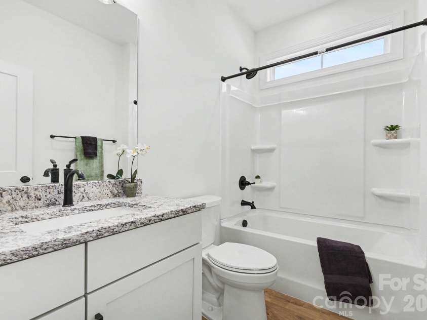 402 Dorothy Drive, China Grove, NC 28023.  MLS# CAR4393216, YatesRealty ID 33659. Secondary bathroom with granite countertops 