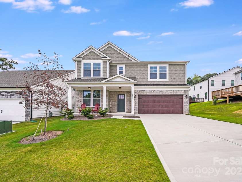 2013 White Cypress Court, Charlotte, NC 28216.  MLS# CAR4292394, YatesRealty ID 33669. Culdesac home with private front views of pond