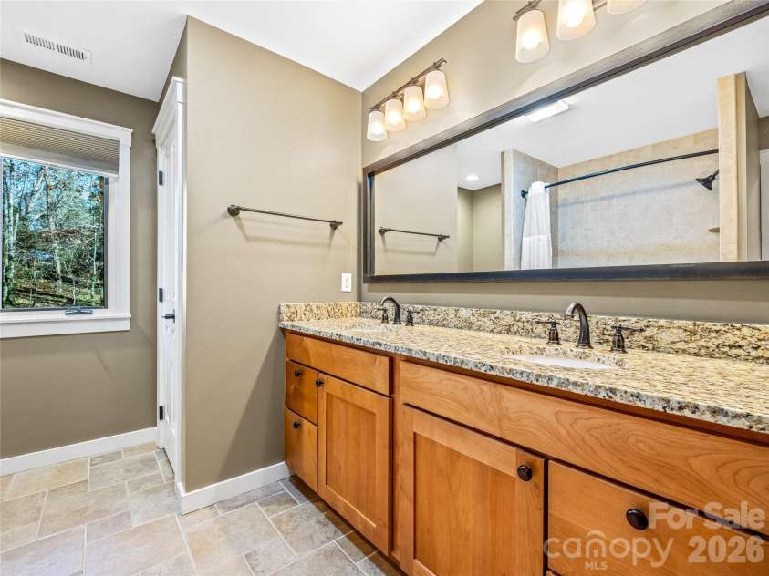 339 Beaverdam Road, Asheville, NC 28804.  MLS# CAR4321982, YatesRealty ID 3367. Hall Bathroom